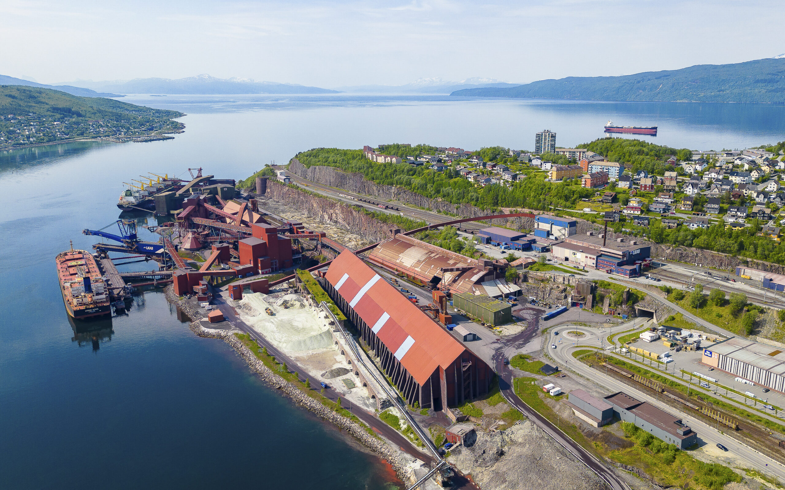 Narvik, Norway - June 20, 2023: Aerial view Narvik industrial harbor in Norway with iron ore company LKAB